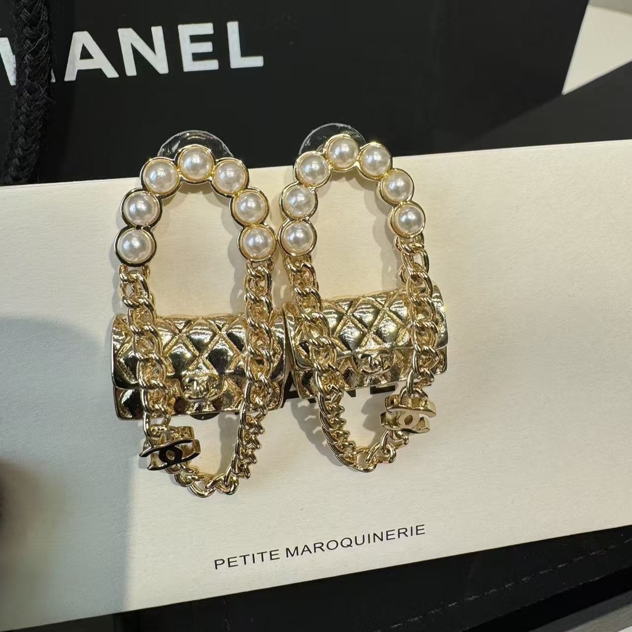Ch**el Earrings