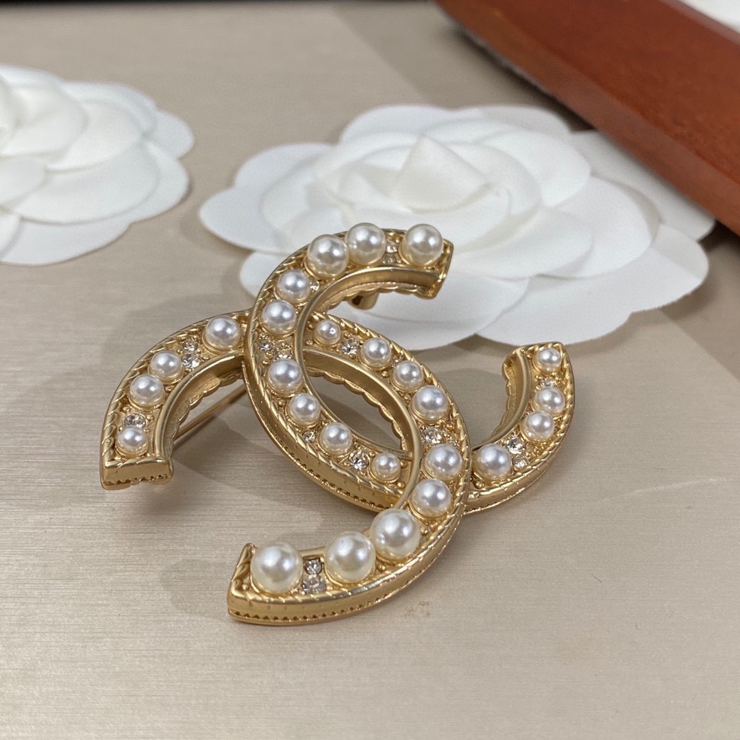 Ch**el Brooch